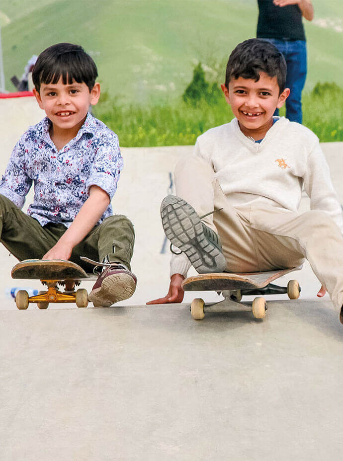 Kids on a skateboard in Iraq