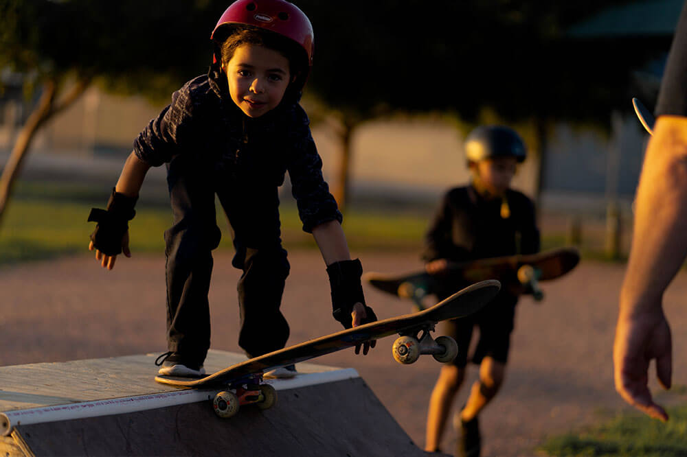 girl on a skateboard ready to drop in