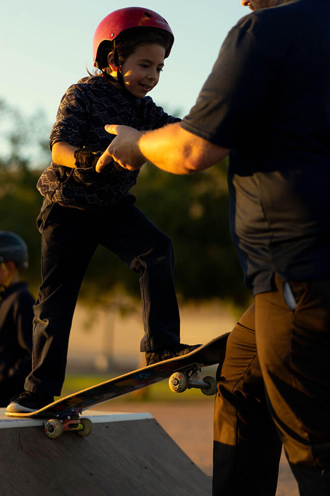 Skate After School girl dropping in on a skateboard